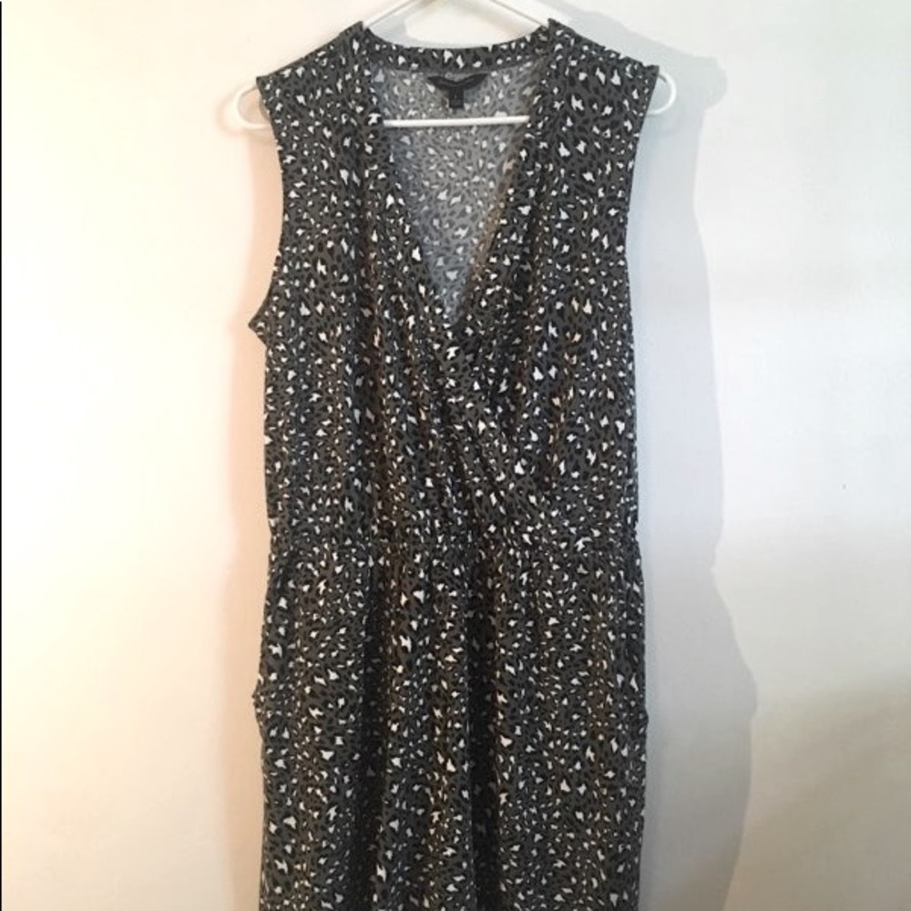 Banana Republic green, black and white leopard print romper in size large.